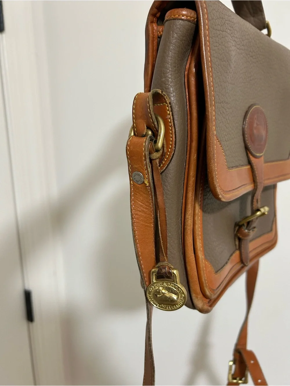 Dooney & Bourke Brown and Tan Pebble Leather Messenger